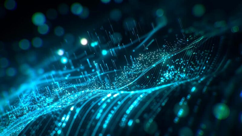 Digital Data Wave Glowing Particles